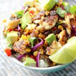Taco bowls get a healthy twist with the addition of spicy blackened tilapia filets, garnished with buttery avocados and a splash of fresh lime juice!