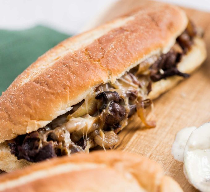 Juicy ribeye steak, caramelized onions and mushrooms, gooey provolone cheese and a mouthwatering horseradish sauce... it's the perfect All-American Cheesesteak! 