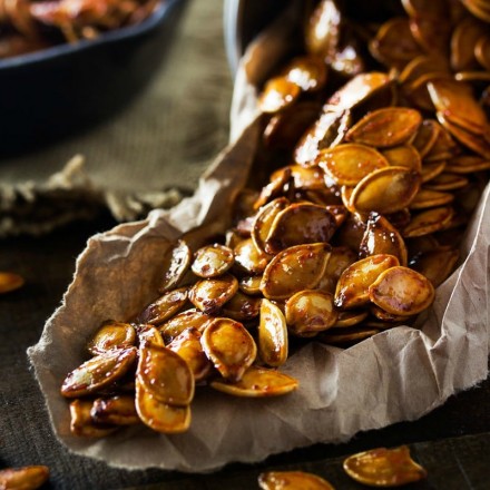 Spiced Honey Roasted Pumpkin Seeds | Waste not, want not... turn leftover pumpkins into a delicious treat! These roasted pumpkin seeds are deliciously savory, with hints of spice and honey!