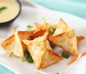 Crab Rangoons | The Chunky Chef | Like your favorite Chinese takeout appetizer... but WAY better!! These crab rangoons are simple to make and taste so good, the whole family will enjoy them!