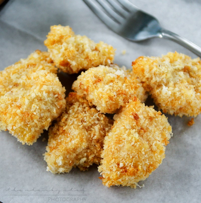 Parmesan Crusted Chicken Nuggets | The Chunky Chef | Amazingly crispy and flavorful baked Parmesan crusted chicken nuggets that both kids and adults will love! Ready in 30 minutes!