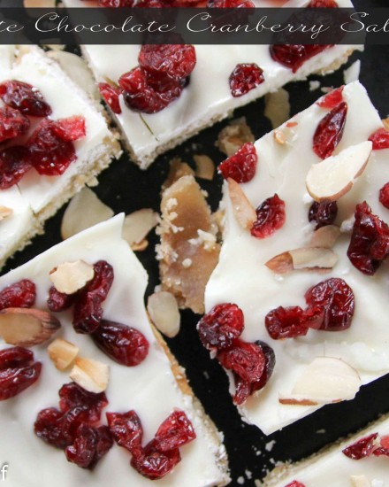 Saltine crackers are transformed into decadent white chocolate covered toffee studded with sweet cranberries and crunchy toasted almonds