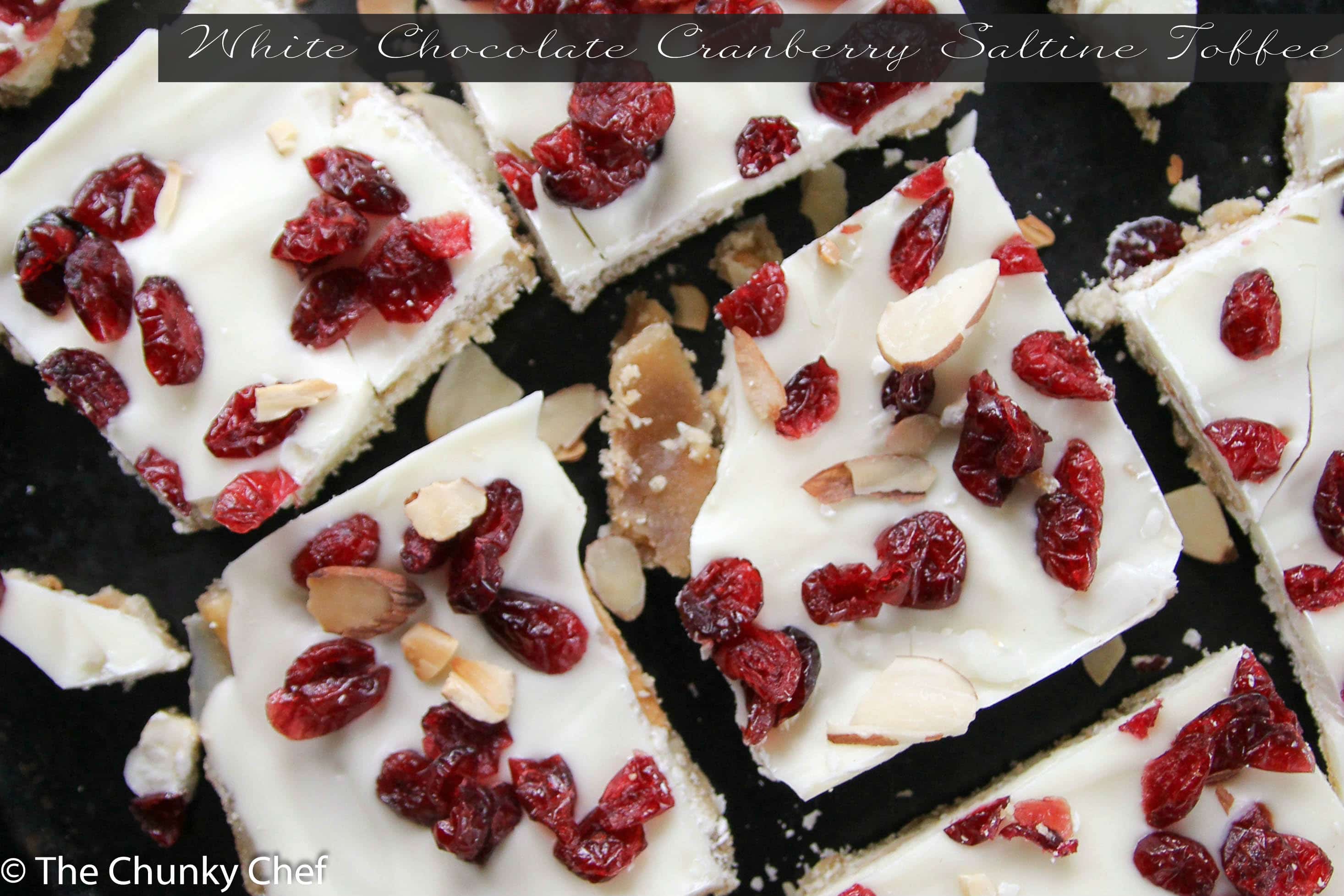 Saltine crackers are transformed into decadent white chocolate covered toffee studded with sweet cranberries and crunchy toasted almonds