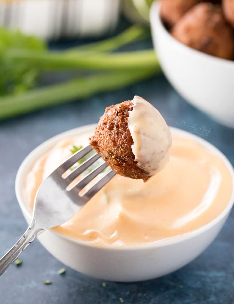 Corn Fritters with Honey Sriracha Aioli | A perfect blend of sweet and savory, these fluffy fritters are packed with flavor, fried to crispy perfection, and served with a spicy honey sriracha aioli. | http://thechunkychef.com