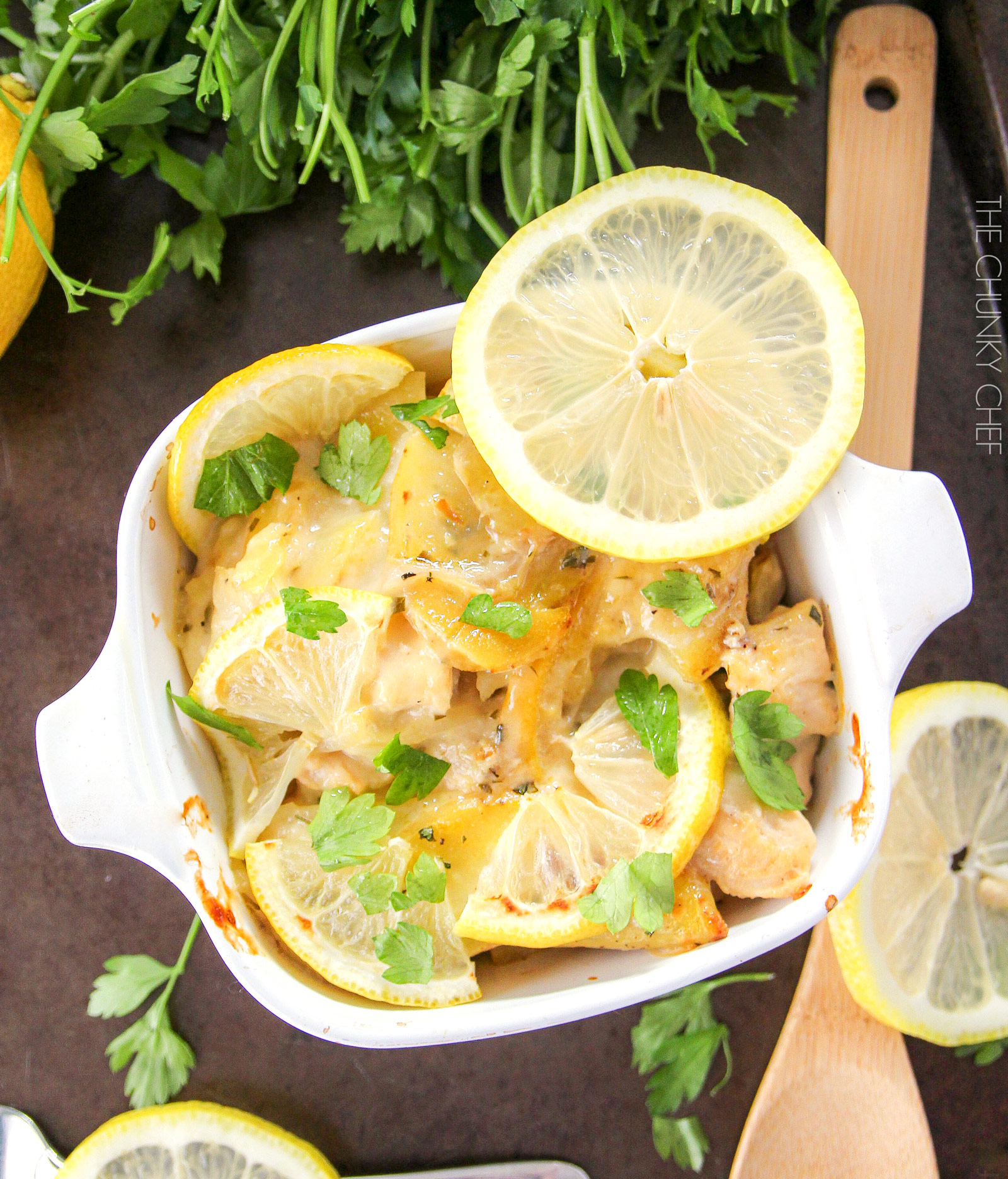 Lemon Chicken and Potato Bake | Chicken and potatoes are baked with lemon slices in a creamy casserole that's sure to fill you up and make you smile! | http://thechunkychef.com