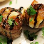 Italian Stuffed Flank Steak | Tender flank steak rolled up with garlic, herbs, prosciutto ham, provolone cheese... flavorful steak medallions that are tasty as they are good looking! | http://thechunkychef.com