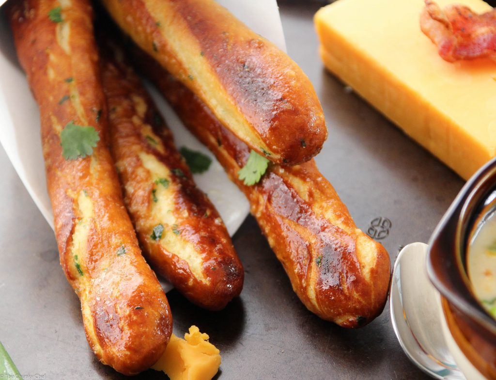 Baked Soft Pretzel Sticks - Soft, tender, buttery and brushed with a garlic and herb butter... these soft pretzel sticks from scratch taste amazingly good!