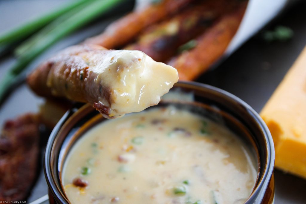 Baked Soft Pretzel Sticks - Soft, tender, buttery and brushed with a garlic and herb butter... these soft pretzel sticks from scratch taste amazingly good!