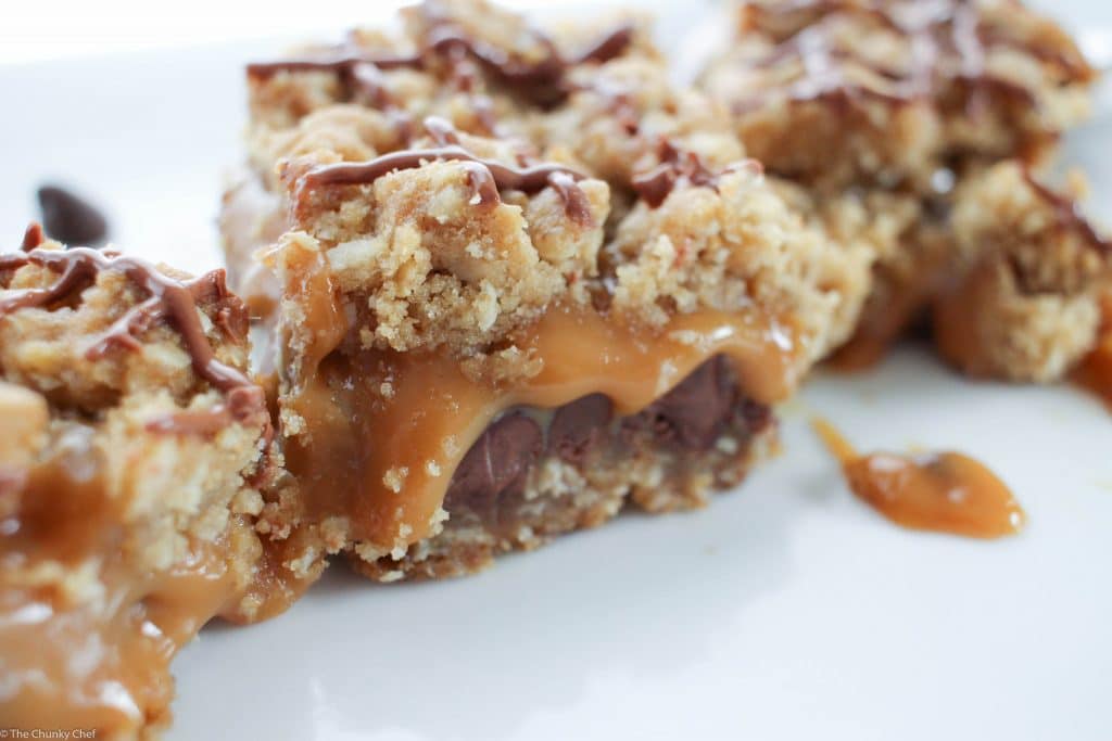 The perfect sweet treat for any occasion... these carmelitas are full of sweet oats, luscious chocolate and decadent melted caramel! Carmelitas - The perfect sweet treat for any occasion... these carmelitas are full of sweet oats, luscious chocolate and decadent melted caramel!