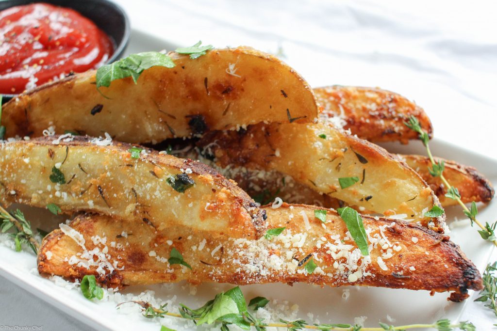 Parmesan and Garlic Wedge Fries - Sometimes you just want a good fry... deliciously crispy on the outside and hot and fluffy on the inside. These wedge fries are seasoned to perfection!
