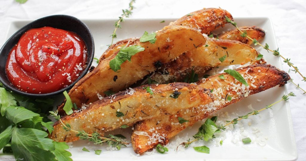 Parmesan and Garlic Wedge Fries - Sometimes you just want a good fry... deliciously crispy on the outside and hot and fluffy on the inside. These wedge fries are seasoned to perfection!