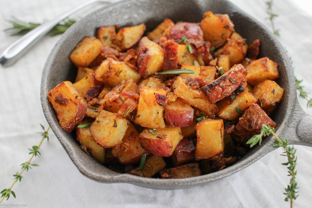 Perfectly seasoned and roasted red-skin potatoes topped with caramelized onions, crispy bacon and fresh herbs. The perfect side dish for breakfast!