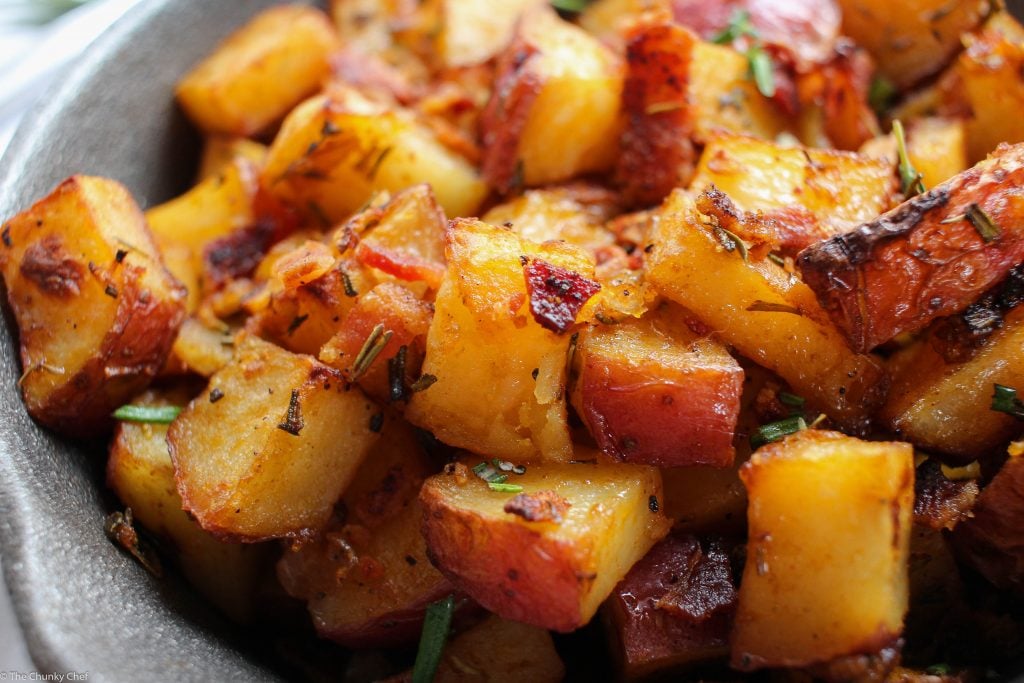 Perfectly seasoned and roasted red-skin potatoes topped with caramelized onions, crispy bacon and fresh herbs. The perfect side dish for breakfast!