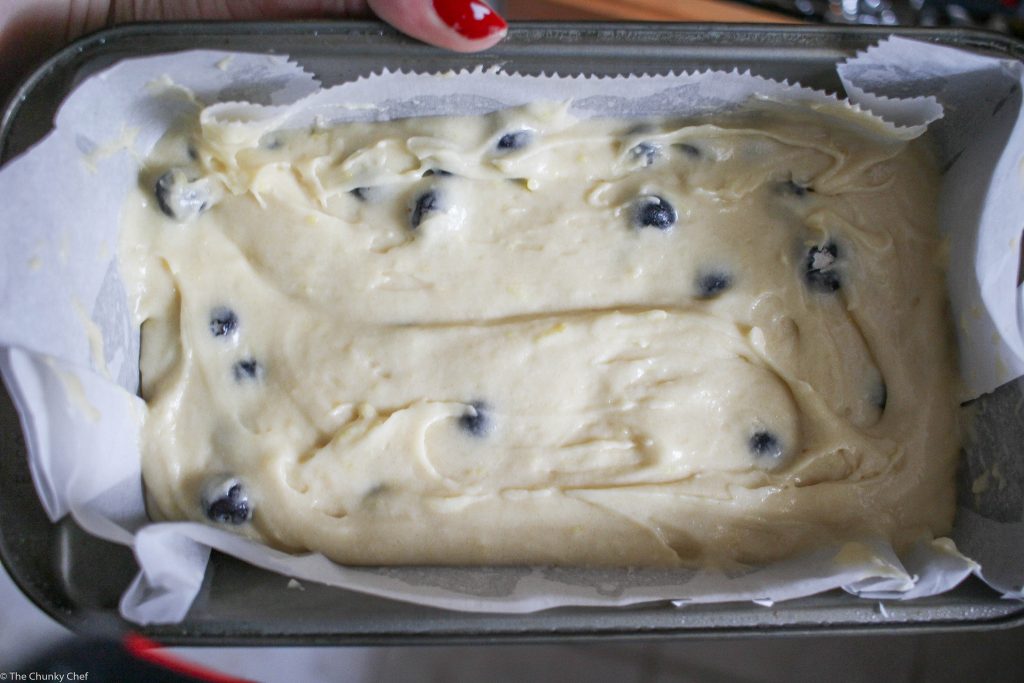 Blueberry Lemon Bread - Sweet bread studded with fresh blueberries, hints of lemon, and drizzled with a decadent lemon cream cheese glaze