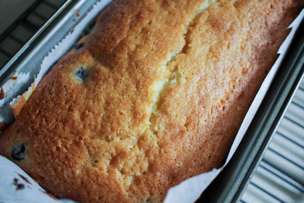 Blueberry Lemon Bread - Sweet bread studded with fresh blueberries, hints of lemon, and drizzled with a decadent lemon cream cheese glaze