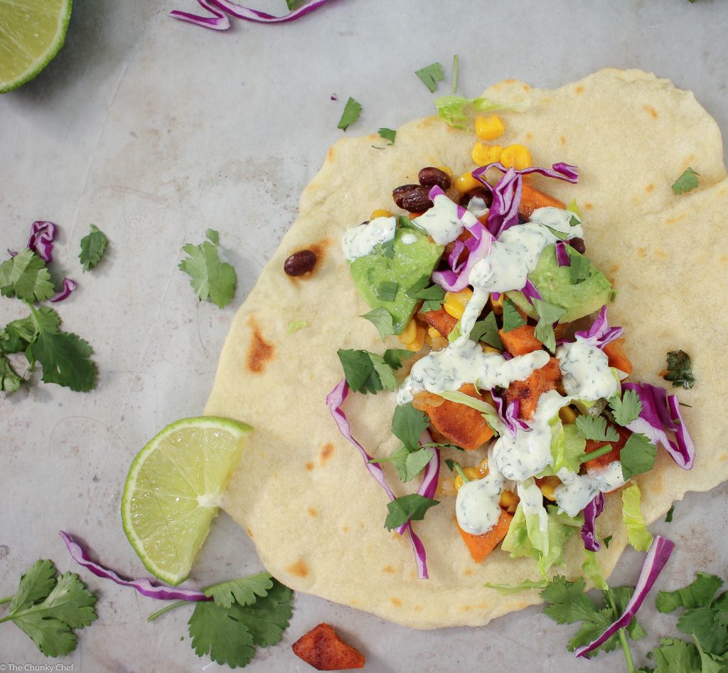 An absolutely delicious vegetarian soft taco that even meat-eaters will LOVE! Sweet potatoes mixed with protein packed black beans make these extra hearty!