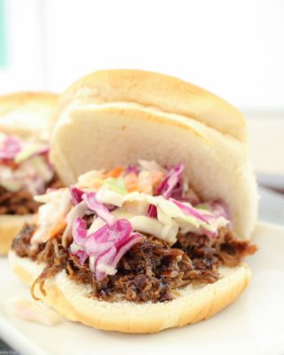 Garlicky, sweet, tangy, succulent and tender... this pulled pork BBQ is a "must have" for your next dinner or get together!