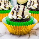 chocolate cupcakes made with guinness in gold and green wrappers