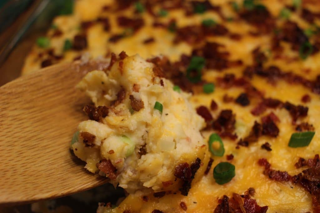 Loaded Mashed Potatoes Bake - All the flavors of your favorite loaded mashed potatoes, baked to creamy perfection.  The perfect side dish for the whole family to enjoy!