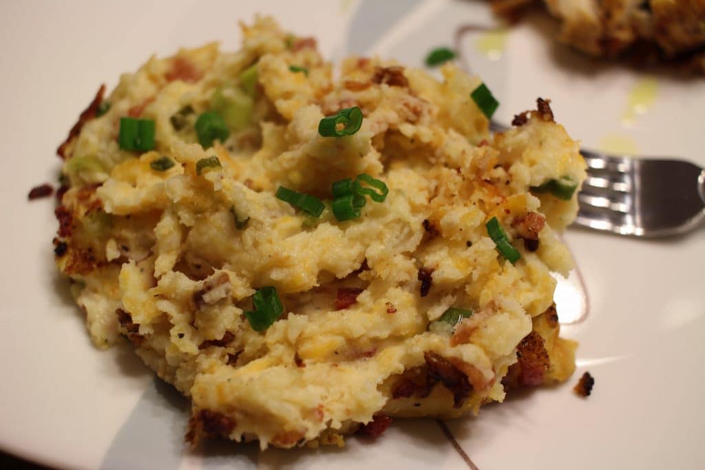 Loaded Mashed Potatoes Bake - All the flavors of your favorite loaded mashed potatoes, baked to creamy perfection.  The perfect side dish for the whole family to enjoy!