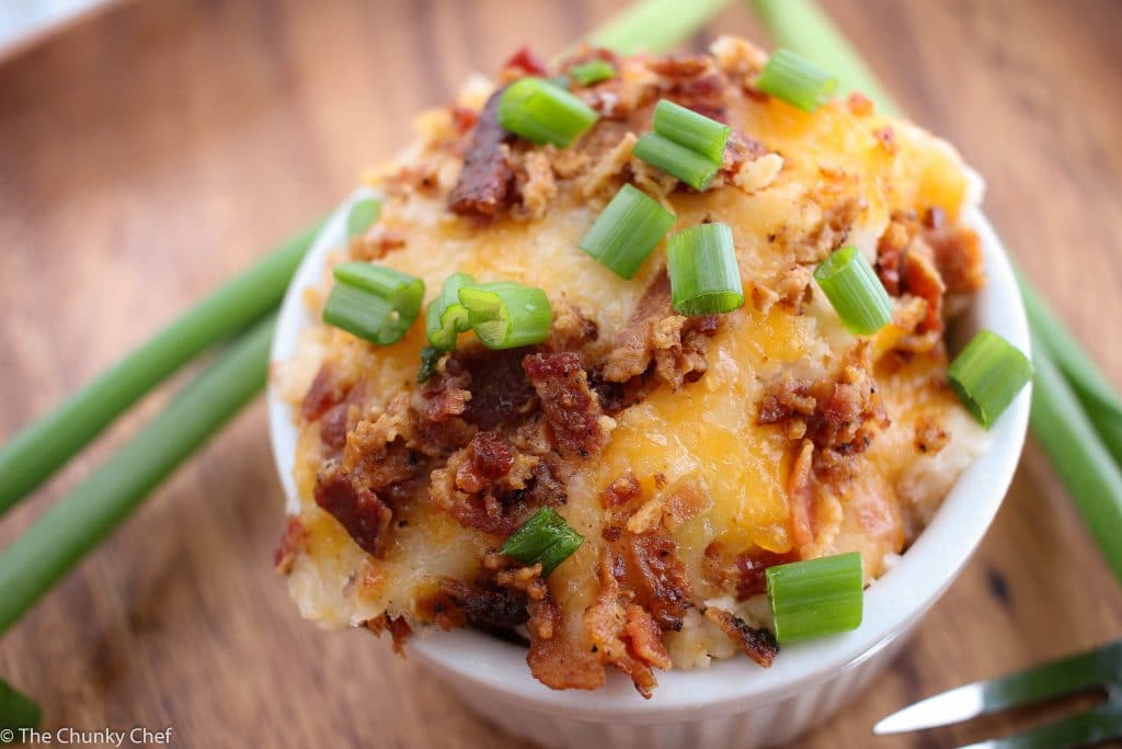 Loaded Mashed Potatoes Bake - All the flavors of your favorite loaded mashed potatoes, baked to creamy perfection.  The perfect side dish for the whole family to enjoy!