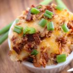 Loaded Mashed Potatoes Bake - All the flavors of your favorite loaded mashed potatoes, baked to creamy perfection. The perfect side dish for the whole family to enjoy!