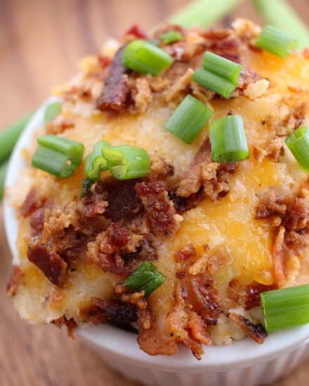 Loaded Mashed Potatoes Bake - All the flavors of your favorite loaded mashed potatoes, baked to creamy perfection. The perfect side dish for the whole family to enjoy!