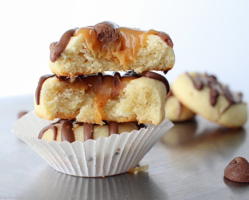 Thumbprint cookies are such a classic... this spin on them includes a gooey caramel center and drizzled melted chocolate. Tastes just like a Twix!