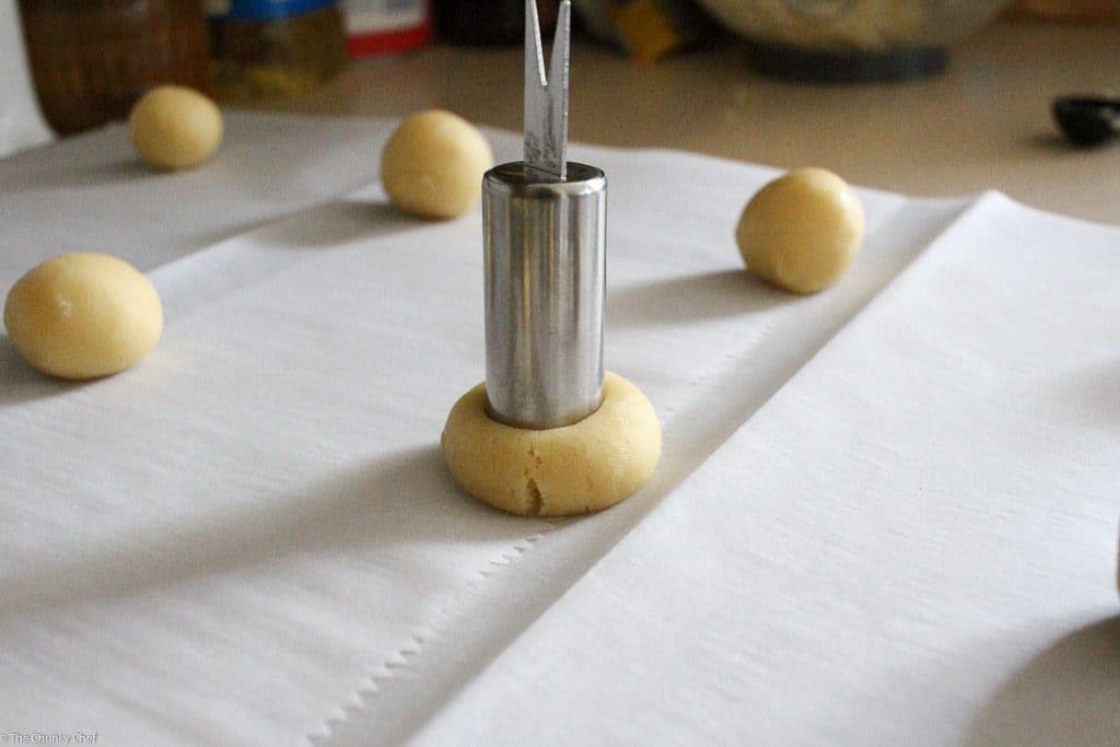 Thumbprint cookies are such a classic... this spin on them includes a gooey caramel center and drizzled melted chocolate. Tastes just like a Twix!