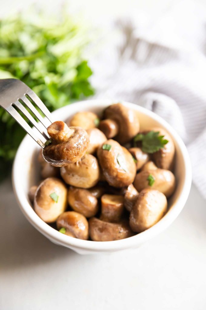 Slow cooker mushroom on fork