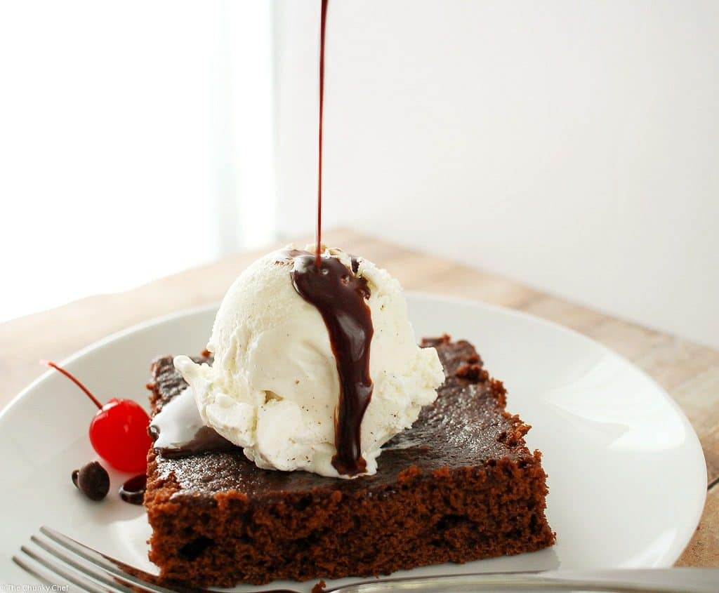 Deliciously fudgy brownies made with Coca-Cola, topped with a generous scoop of vanilla bean ice cream, and drizzled with a coca cola chocolate sauce!