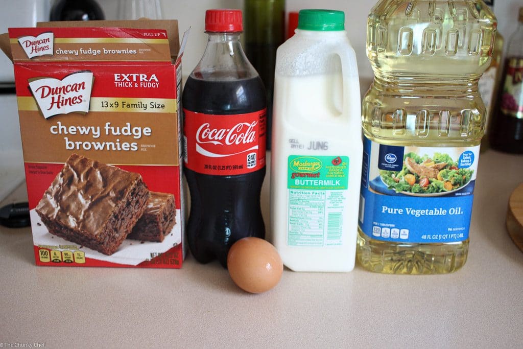 Deliciously fudgy brownies made with Coca-Cola, topped with a generous scoop of vanilla bean ice cream, and drizzled with a coca cola chocolate sauce!