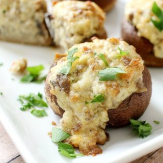 Perfect for a party, or as a side dish for your meal... you have to try these sausage stuffed mushrooms! They're creamy, flavorful, and EASY!