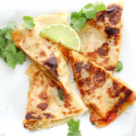 Do you love chicken fajitas? Do you love quesadillas? Combine the two and you have one amazing quesadilla you'll want to make over and over!