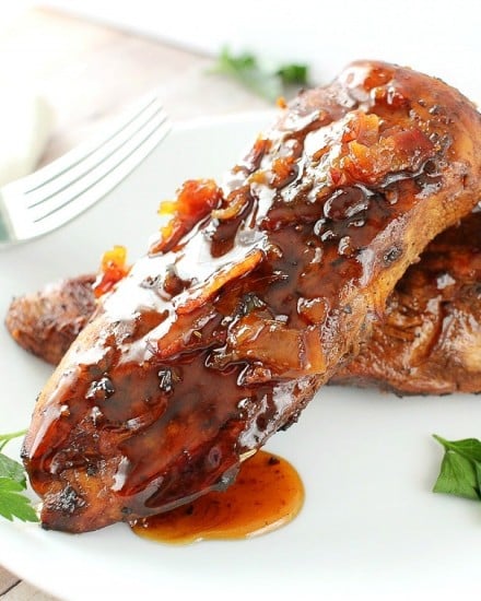 Marinated chicken, grilled to perfection and drizzled with a spicy honey bacon glaze. This glazed chicken will be a family favorite!