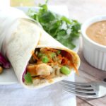 A 5 minute dinner or lunch? Is that even possible? Yes it sure is! Try these spicy Thai peanut chicken wraps... light on time, but crazy good flavor!