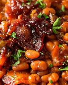 Brown Sugar and Bacon Bacon Beans | These baked beans are semi-homemade and the perfect blend of sweet, savory and smoky! Topped with delicious bacon, they're sure to be a hit! | http://thechunkychef.com
