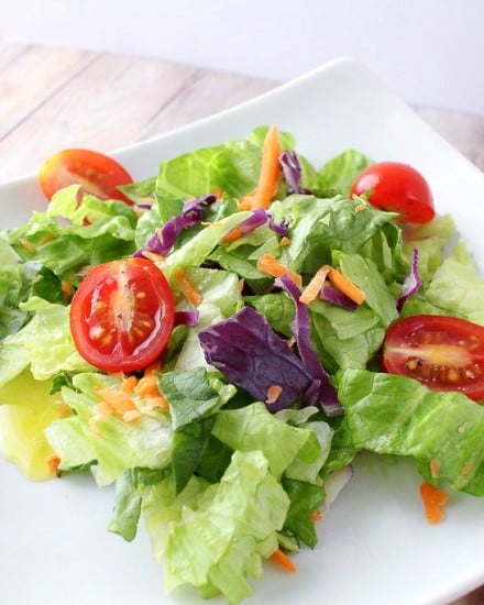 A simple red wine vinaigrette with the added flavors of shallot, basil, mustard, and a touch of honey. 1000x better than store-bought dressings!