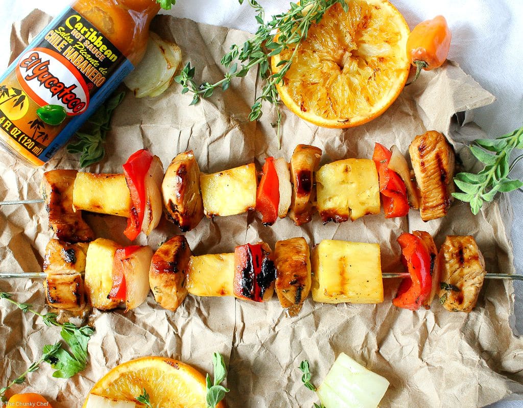 Taste the Caribbean in these citrus habanero chicken skewers... marinated chicken, onions, peppers, and pineapple.. all grilled to smoky charred perfection!