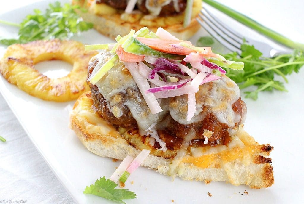 These Hawaiian meatball sliders are juicy, cheesy, sweet with a little spicy kick, and topped off with a crunchy and flavorful jicama slaw!