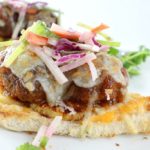 These Hawaiian meatball sliders are juicy, cheesy, sweet with a little spicy kick, and topped off with a crunchy and flavorful jicama slaw!