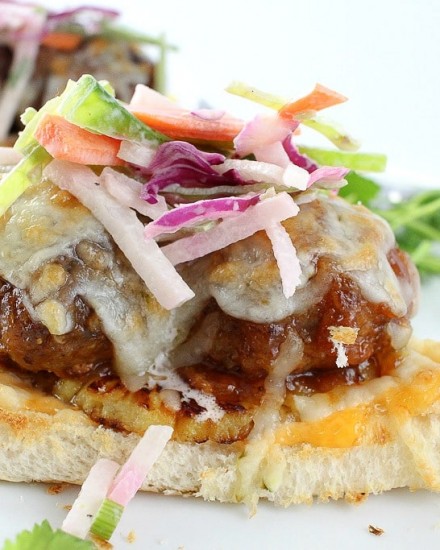 These Hawaiian meatball sliders are juicy, cheesy, sweet with a little spicy kick, and topped off with a crunchy and flavorful jicama slaw!