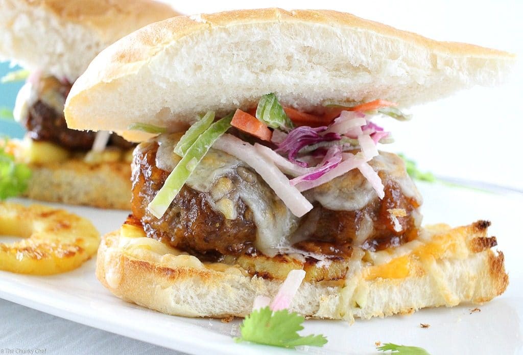 These Hawaiian meatball sliders are juicy, cheesy, sweet with a little spicy kick, and topped off with a crunchy and flavorful jicama slaw!