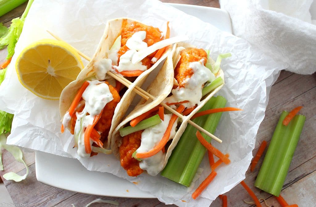 A combination of two classic foods... buffalo chicken wings and mini tacos. Complete with crunchy carrot and celery slaw and creamy blue cheese dressing!