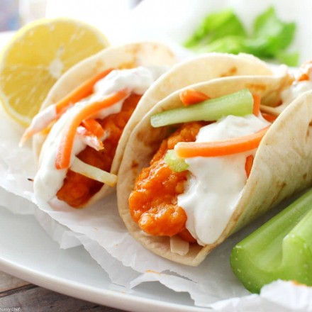 A combination of two classic foods... buffalo chicken wings and mini tacos. Complete with crunchy carrot and celery slaw and creamy blue cheese dressing!