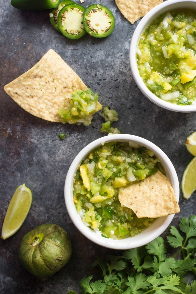 This copycat of Abuelo's tomatillo lime salsa is so close, you'll think you're actually at the restaurant!  Bright, fresh, and ready in 5 minutes! #salsa #tomatillo #lime #copycat #abuelos #greensalsa #easyrecipe #Mexican #copycatrecipe