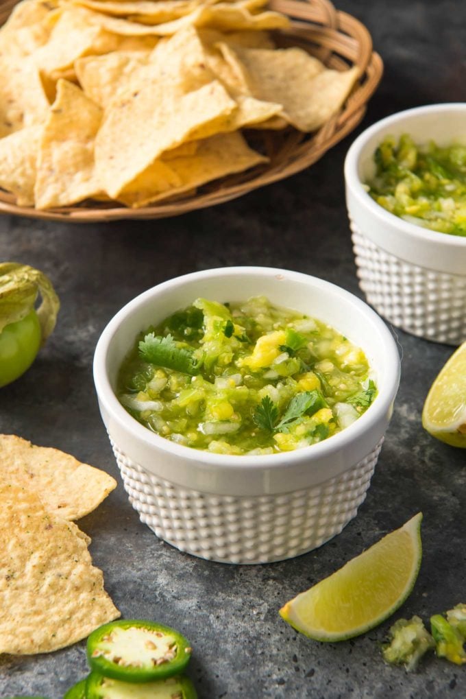This copycat of Abuelo's tomatillo lime salsa is so close, you'll think you're actually at the restaurant!  Bright, fresh, and ready in 5 minutes! #salsa #tomatillo #lime #copycat #abuelos #greensalsa #easyrecipe #Mexican #copycatrecipe