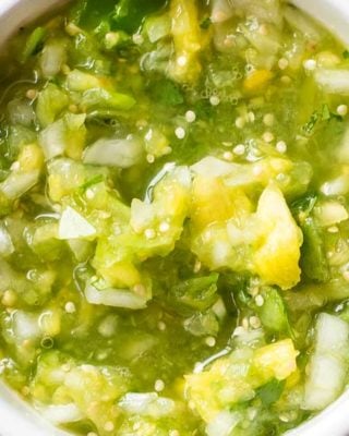 This copycat of Abuelo's tomatillo lime salsa is so close, you'll think you're actually at the restaurant! Bright, fresh, and ready in 5 minutes! #salsa #tomatillo #lime #copycat #abuelos #greensalsa #easyrecipe #Mexican #copycatrecipe