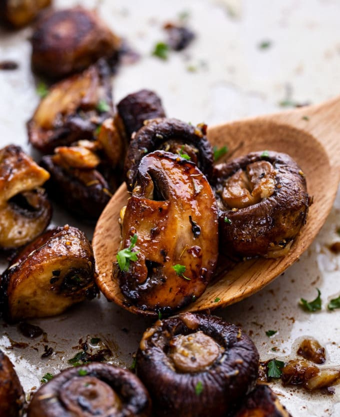 roasted mushrooms on serving spoon