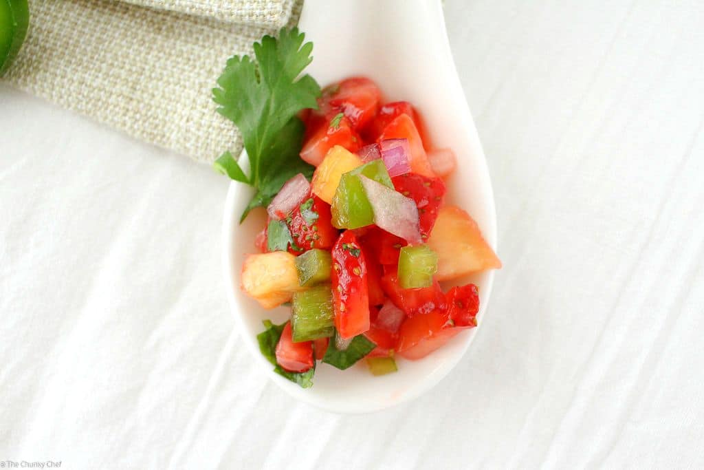 The Chunky Chef | Strawberry Jalapeno and Pineapple Salsa: Fresh, summery, and tasty!  This strawberry jalapeno and pineapple salsa is perfect with crisp tortilla chips, or as a topper for some grilled chicken.